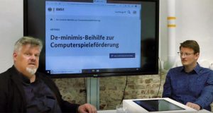 Die Experten Malte Behrmann und André Bernhardt erklären in ihrem YouTube-Video, wie die neue Computerspiele-Förderung des Bundes funktioniert.