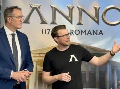 30 Jahre Ubisoft Mainz: Schweitzer und Guillemot gratulieren Creative Director Manuel Reinher erklärt dem rheinland-pfälzischen Ministerpräsidenten Alexander Schweitzer (SPD) die Neuerungen von Anno 117 (Foto: GamesWirtschaft)