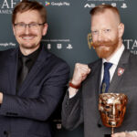 Prokop Jirsa und Tobias Stolz-Zwilling von Warhorse Studios nehmen die BAFTA Games Awards 2026 für Kingdom Come Deliverance 2 in der Kategorie 'Narrative' entgegen.