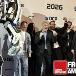 Das Jubeln der Anderen: Bayerns Ministerpräsident und DCP-Laudator Markus Söder (CSU) mit dem Anno 117-Team von Ubisoft Mainz beim Deutschen Computerspielpreis 2026 in München.