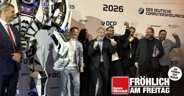 Das Jubeln der Anderen: Bayerns Ministerpräsident und DCP-Laudator Markus Söder (CSU) mit dem Anno 117-Team von Ubisoft Mainz beim Deutschen Computerspielpreis 2026 in München.